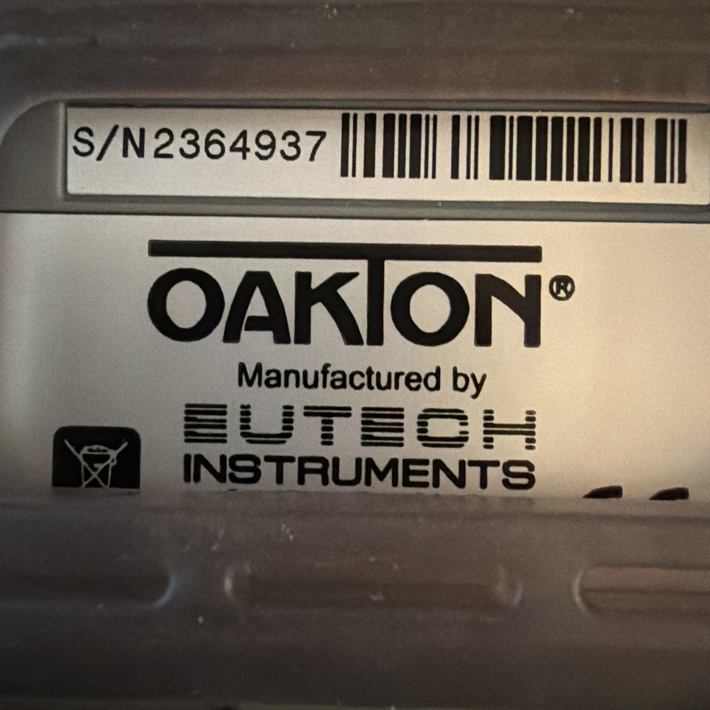 Serial number label and manufacturer logo on Oakton SALT 6+ Handheld Salinity Meter by Eutech Instruments