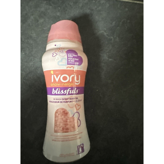 Ivory Snow Blissfuls in-wash scent booster beads bottle in Baby Fresh scent with pink granules and purple label