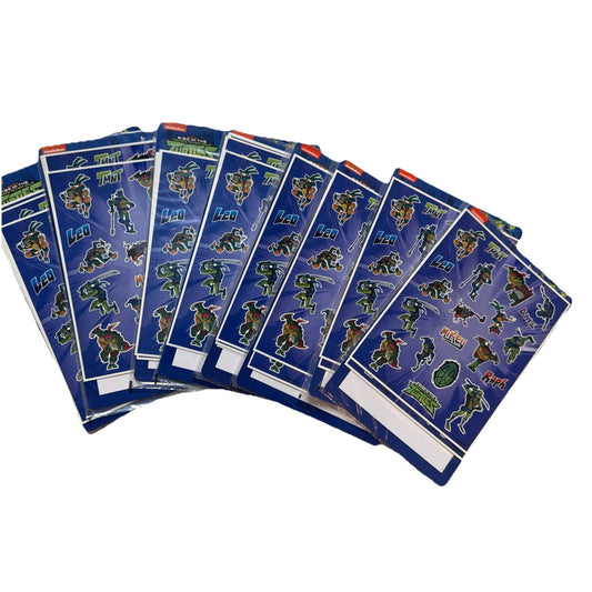 Set of Teenage Mutant Ninja Turtles party favor sticker sheets featuring characters and logos on blue background