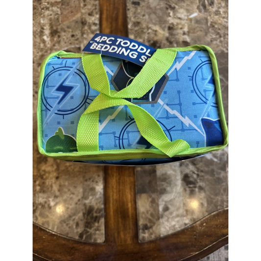 PJ Masks 4-piece toddler bedding set in blue with green trim packaged in carrying case with handle
