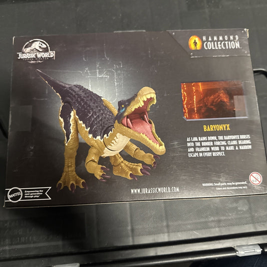 Jurassic World Baryonyx 12-inch action figure from Hammond Collection in unopened packaging with black background