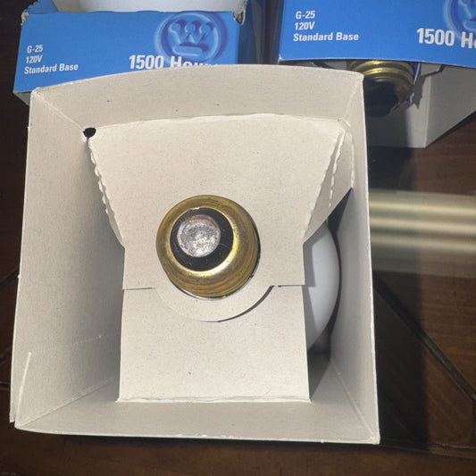 Set of three vintage Westinghouse and GE 60 Watt G25 frosted clear vanity globe light bulbs in packaging box view