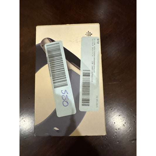 Fitbit Versa 4 Fitness Smartwatch box with Waterfall Blue band and Platinum Aluminum Case showing barcode labels on top