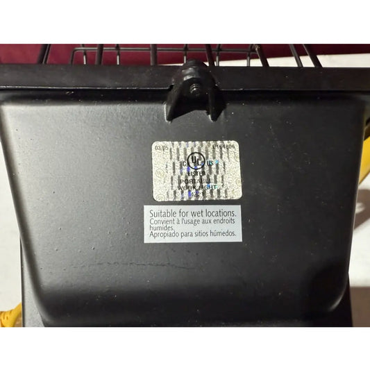 Close-up of heavy duty work light model L 18 showing UL Listed label and suitability for wet locations warning