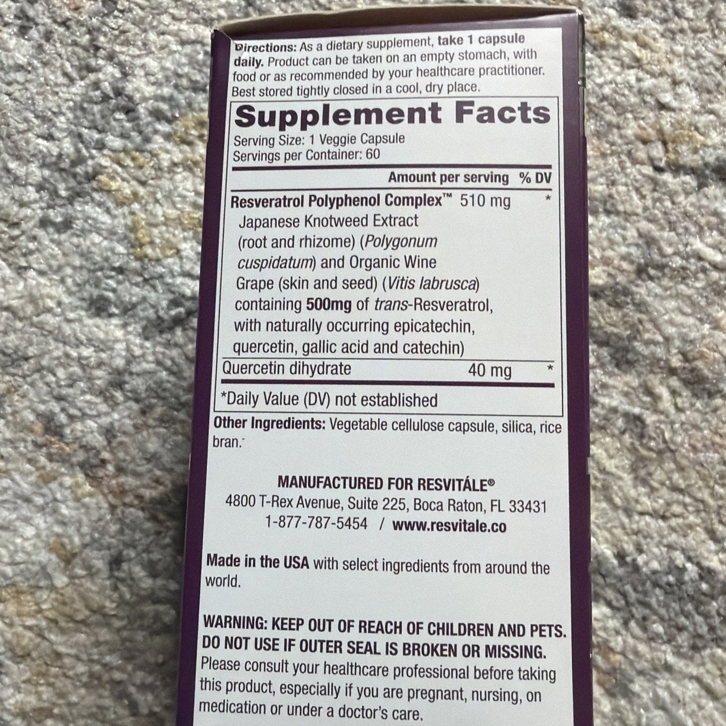 Back panel of a dietary supplement box showing supplement facts including 510 mg Resveratrol Polyphenol Complex and 40 mg Quercetin dihydrate, usage directions, warning, manufacturer info, and storage instructions.