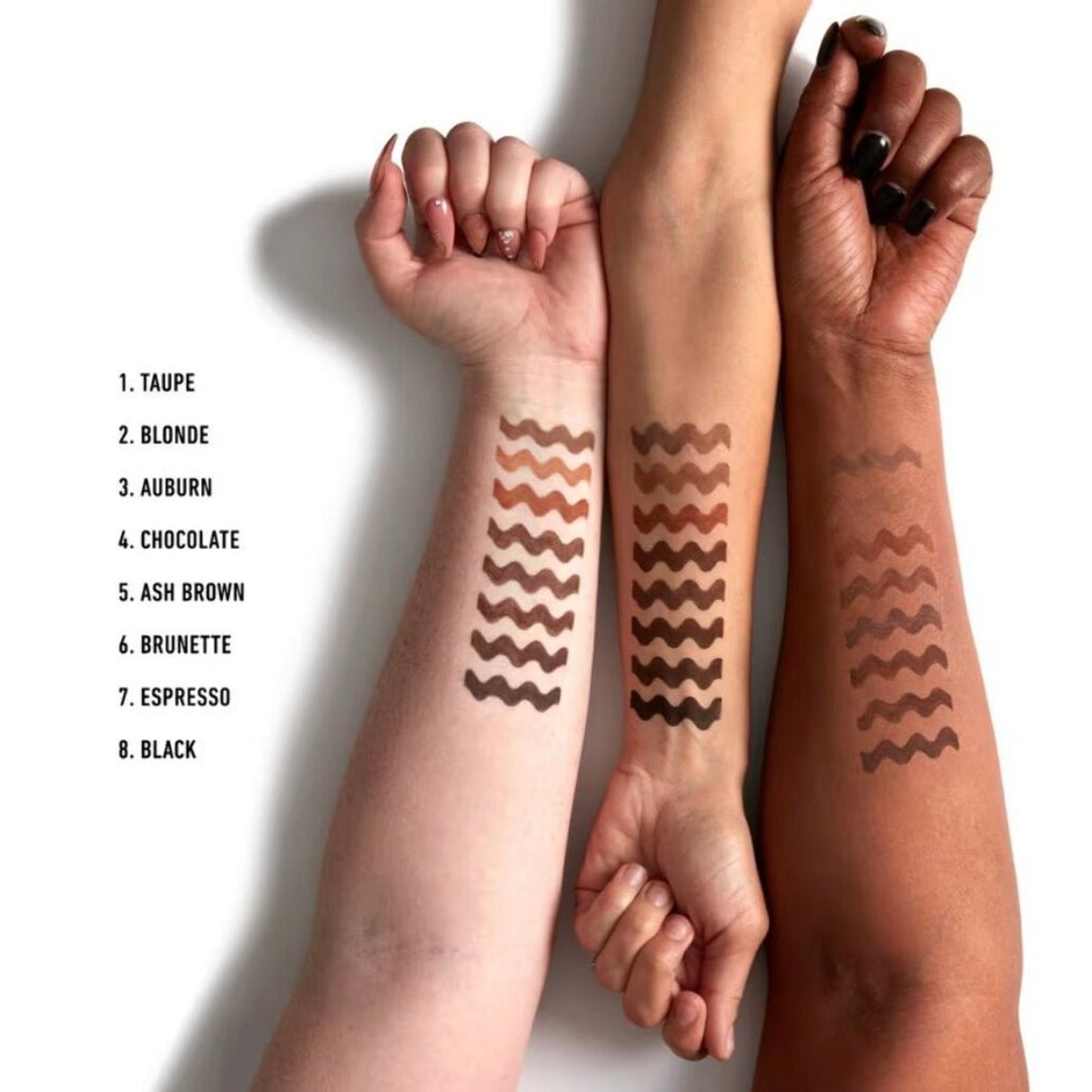 Three arms with varying skin tones display eight wavy swatches of eyebrow pencil shades from light taupe to deep black, labeled clearly on a white background.