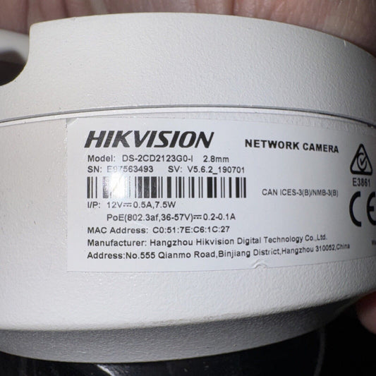 Hikvision DS-2CD2123G0-I dome network camera label showing model, serial number, power specs, and manufacturer info