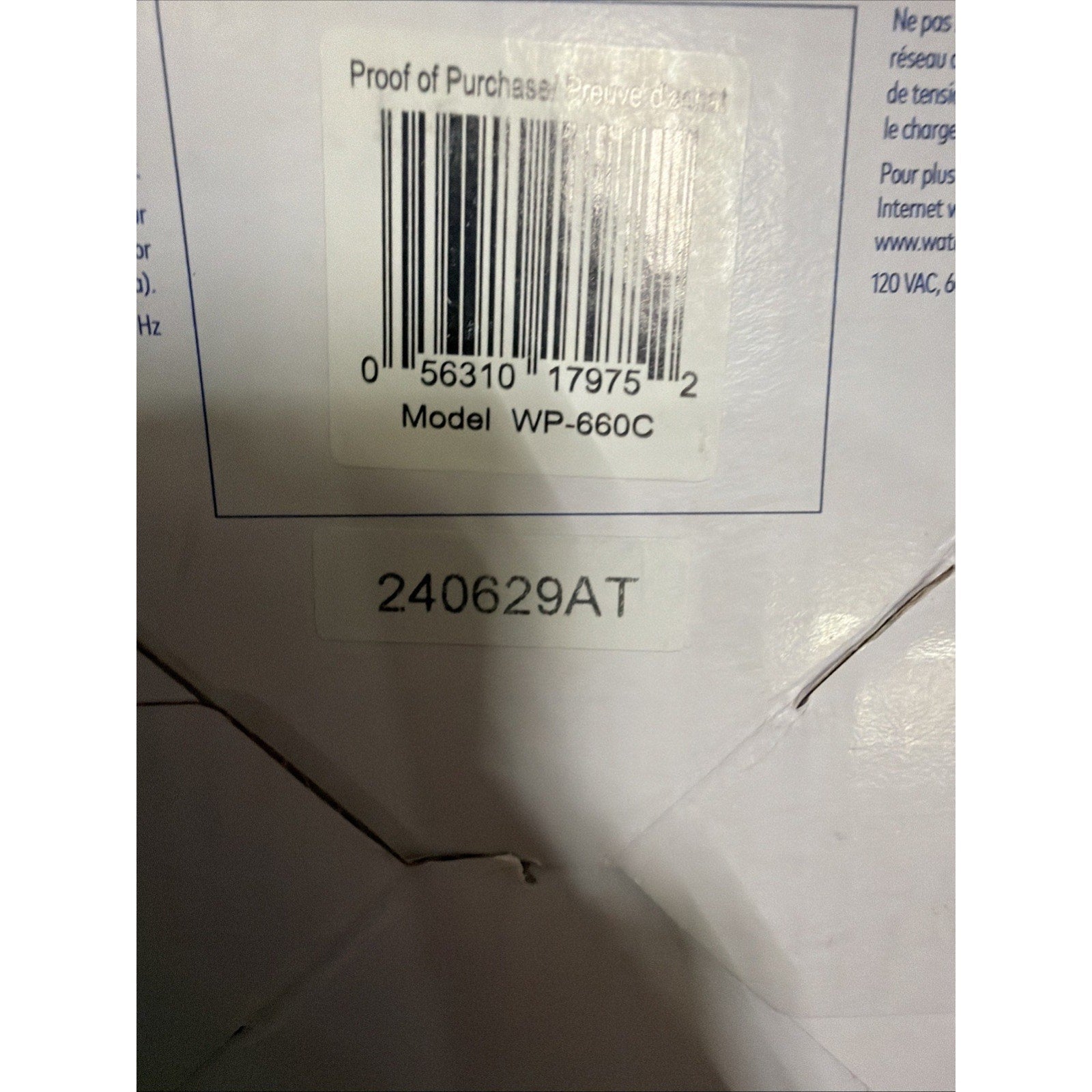 Close-up of a white product box showing a barcode labeled 