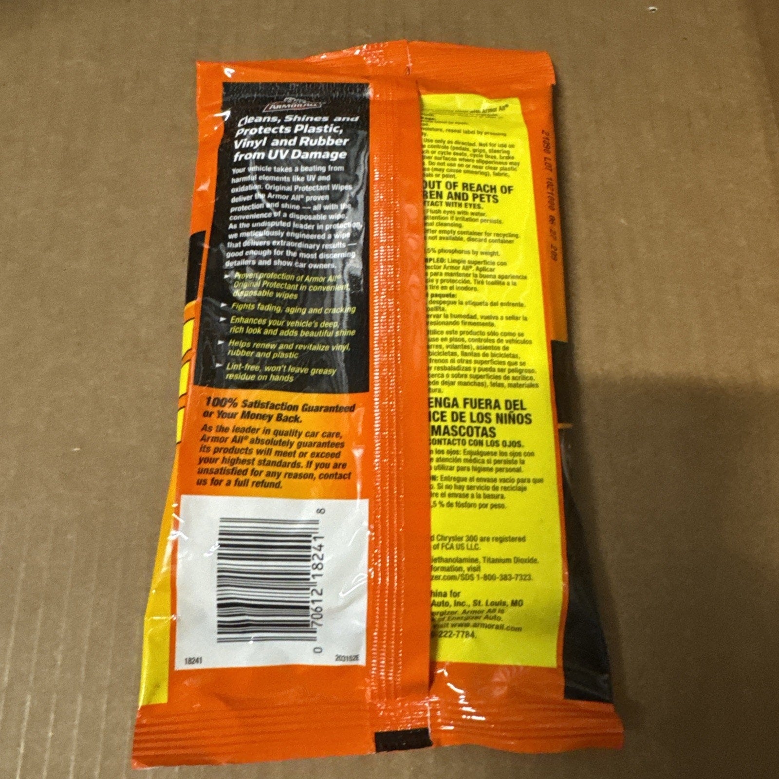 Armor All vehicle protectant wipe packet showing cleaning and protection benefits for plastic vinyl and rubber surfaces