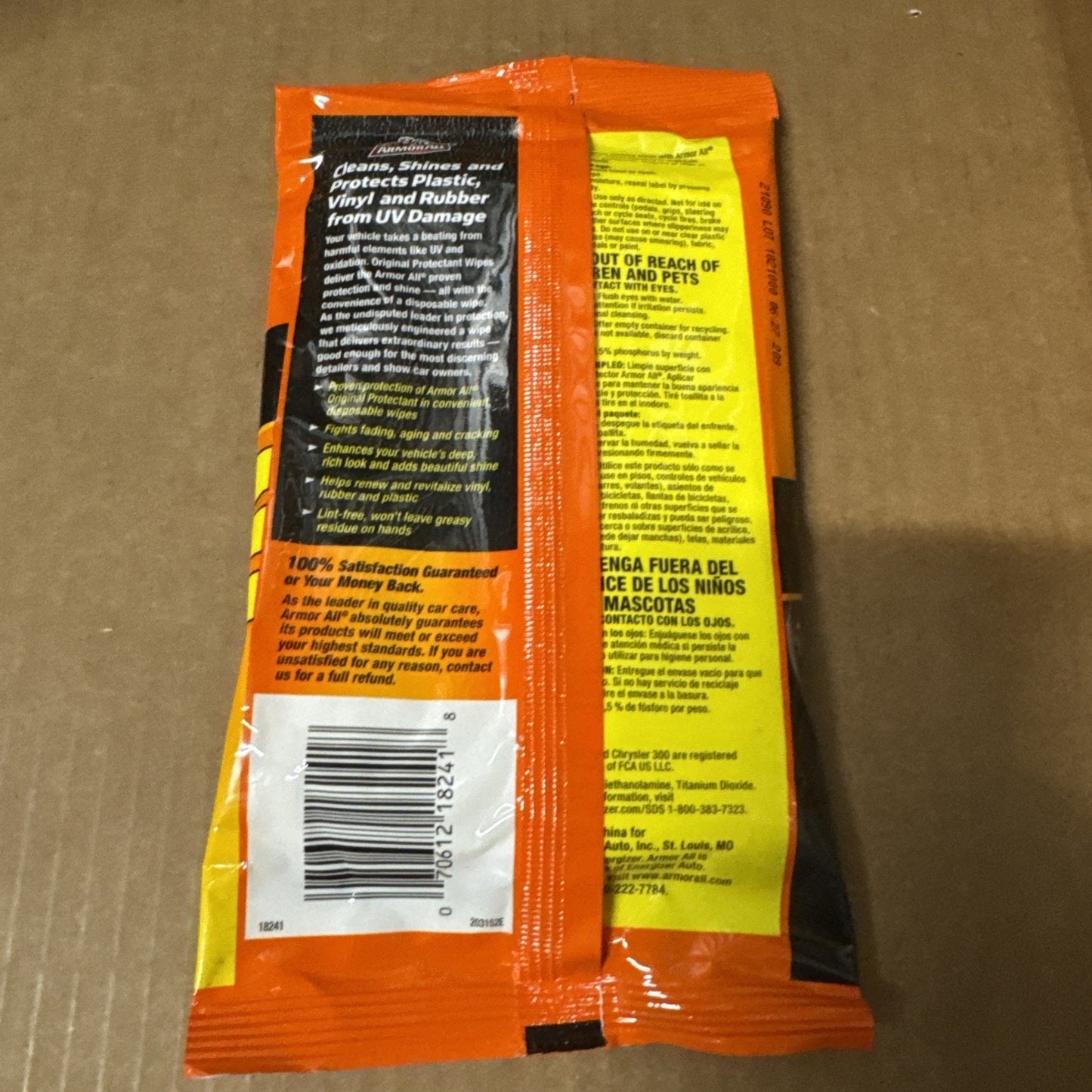 Armor All vehicle protectant wipe packet showing cleaning and protection benefits for plastic vinyl and rubber surfaces