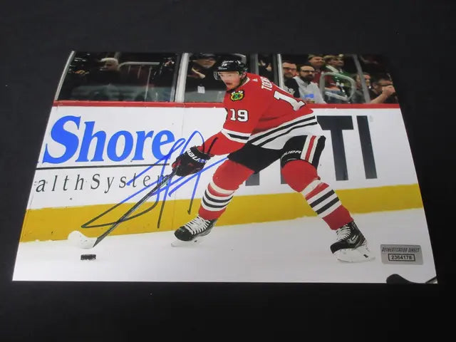 JONATHAN TOEWS SIGNED 8X10 PHOTO WITH COA