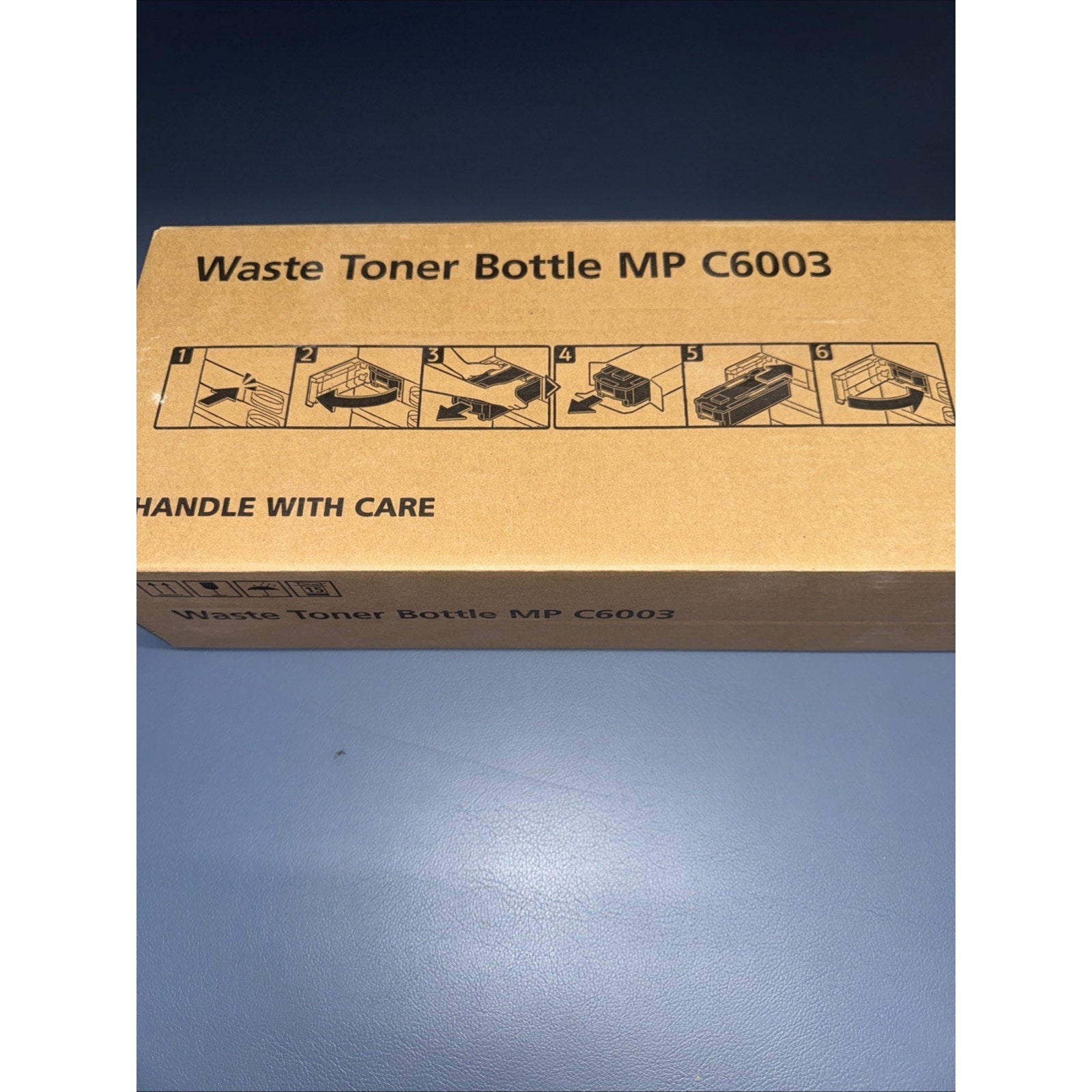 New Waste Toner Bottle MP C6003 model D860-01 in cardboard box with installation instructions printed on top