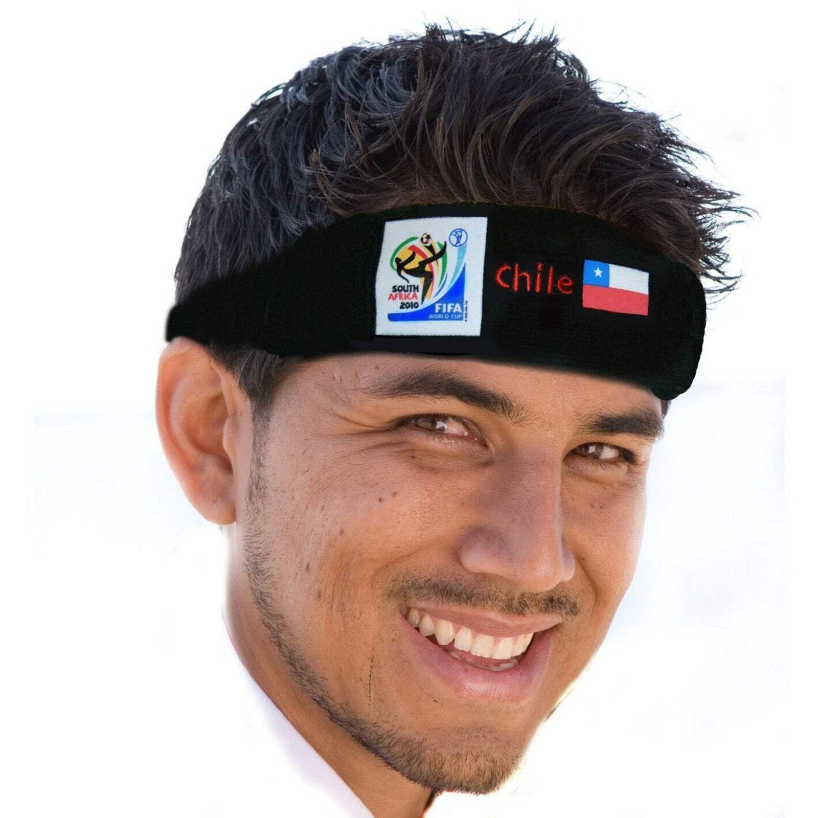 Young man smiling and wearing a black headband featuring the 2010 FIFA World Cup logo, the Chilean flag, and the word "Chile" on a white background.