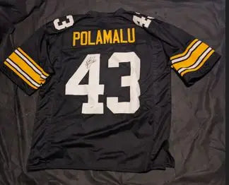 Troy Polamalu autographed steelers jersey with coa sticker