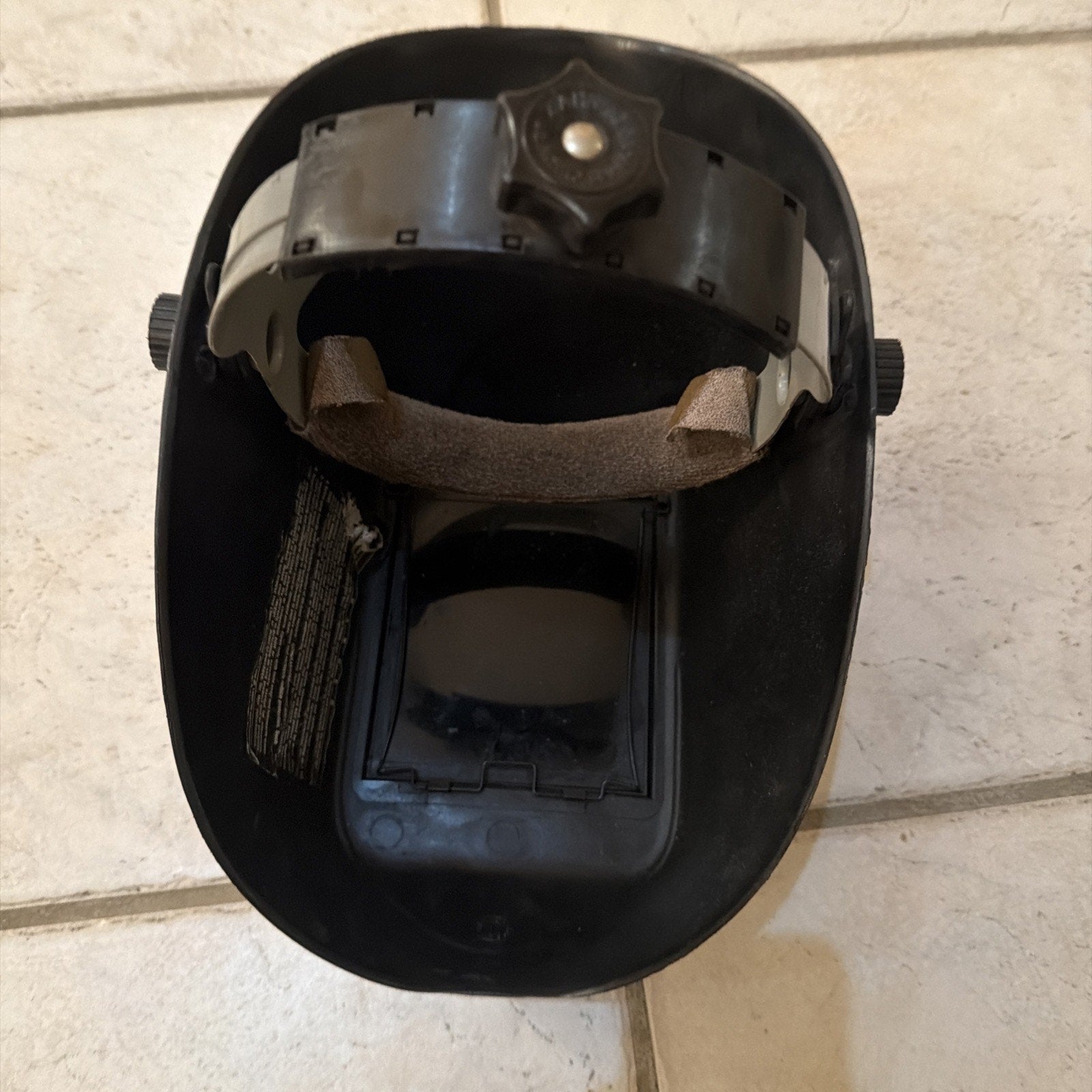 Jackson Safety HSL100 Glory Welding Helmet PRO-V auto-darkening front view showing headgear adjustment knob and lens area