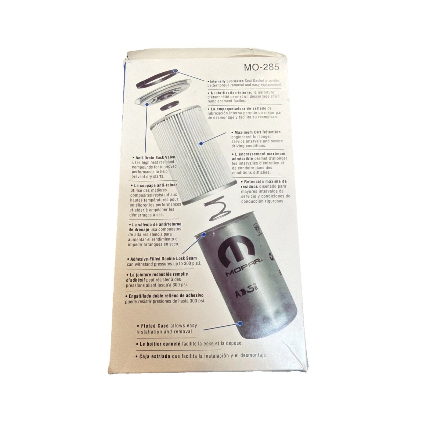 White product packaging featuring a detailed exploded view illustration of a cylindrical automotive oil filter and its components, with multilingual descriptions and labeled features.