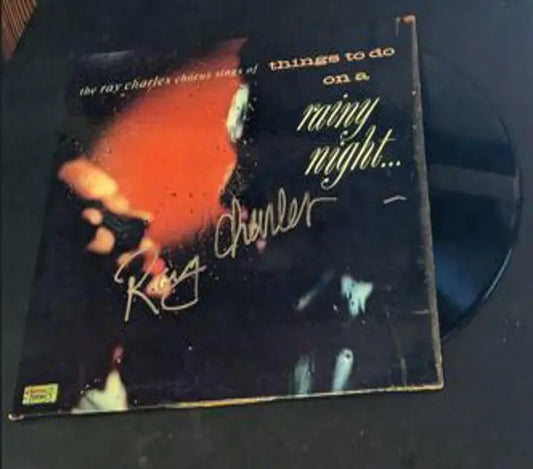 Ray Charles Autographed Rainy Night album cover with coa(album defective but included)