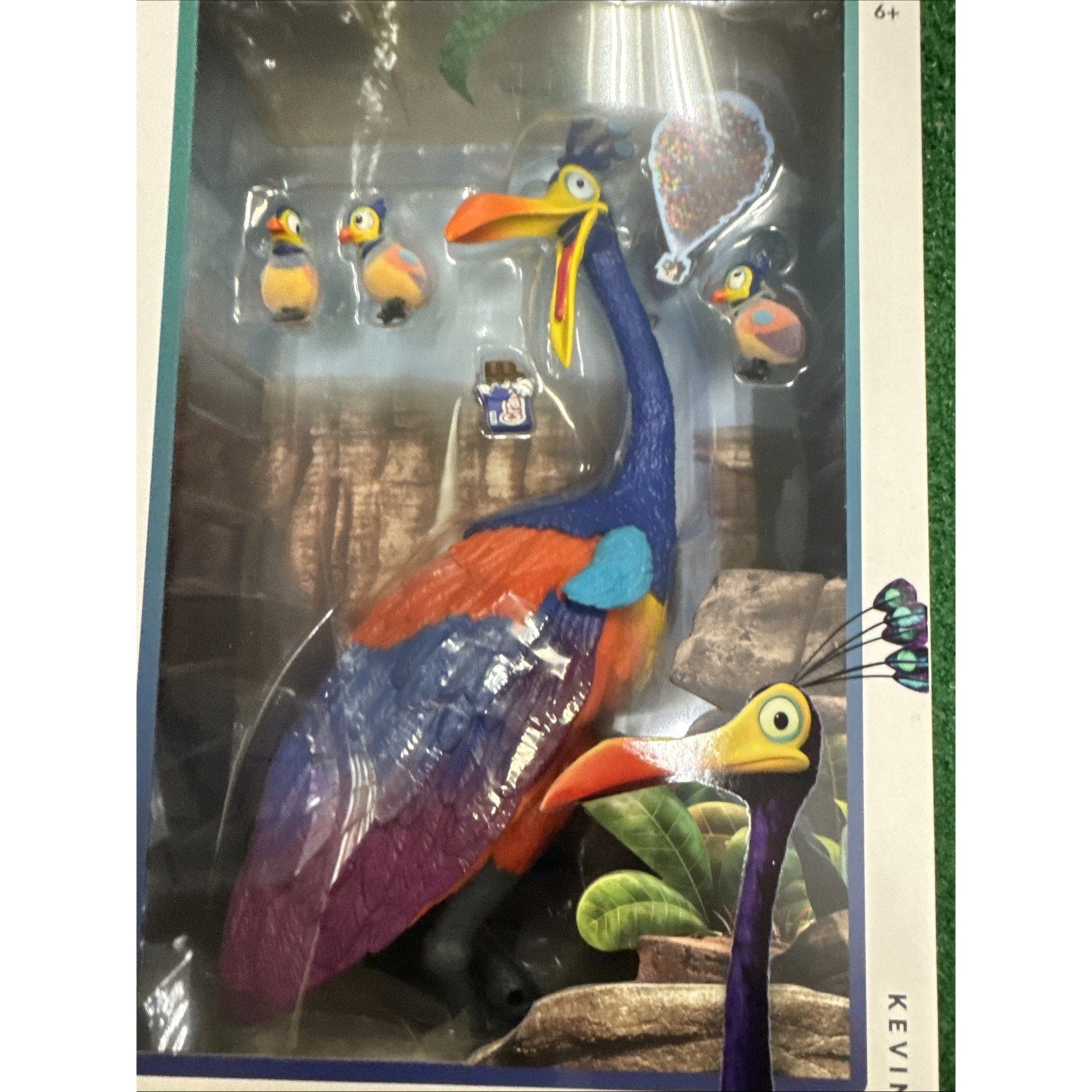 Pixar Up Kevin and babies 11.2 inch figure set in vibrant blue, orange, and purple colors with detailed feathers display