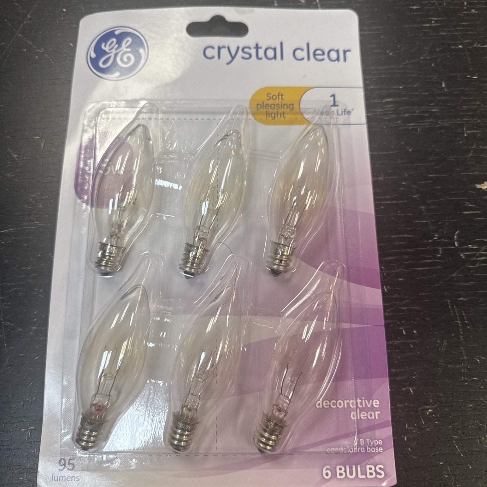 6-pack GE crystal clear soft white 15 watt decorative light bulbs with candle shape and E12 base in retail packaging