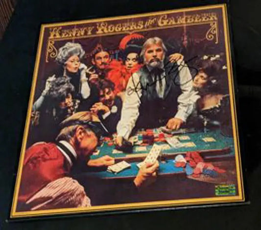 Kenny Rogers autographed the gambler album with coa