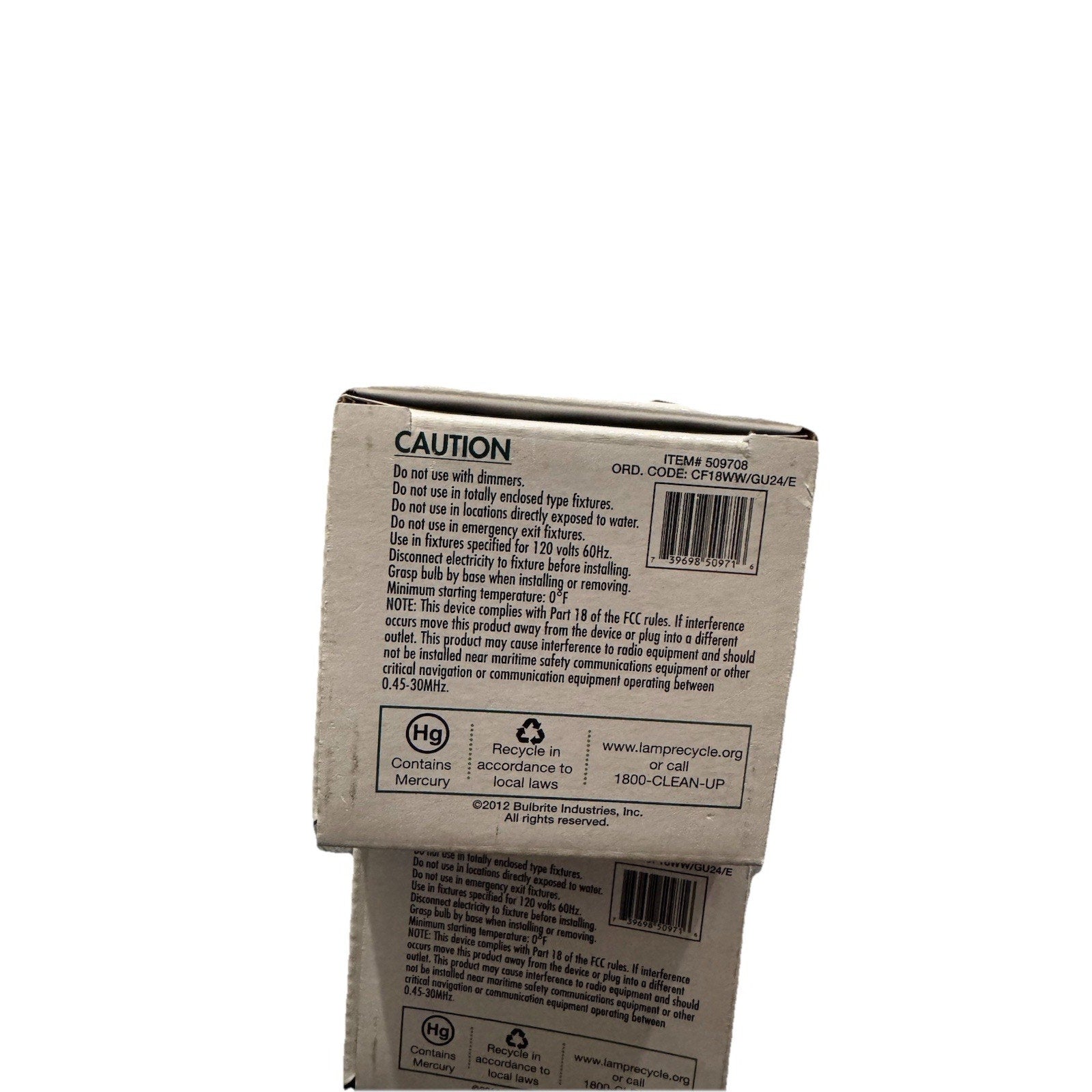 Back view of Energy Wiser GU24 CFL bulb packaging showing caution and recycling information text