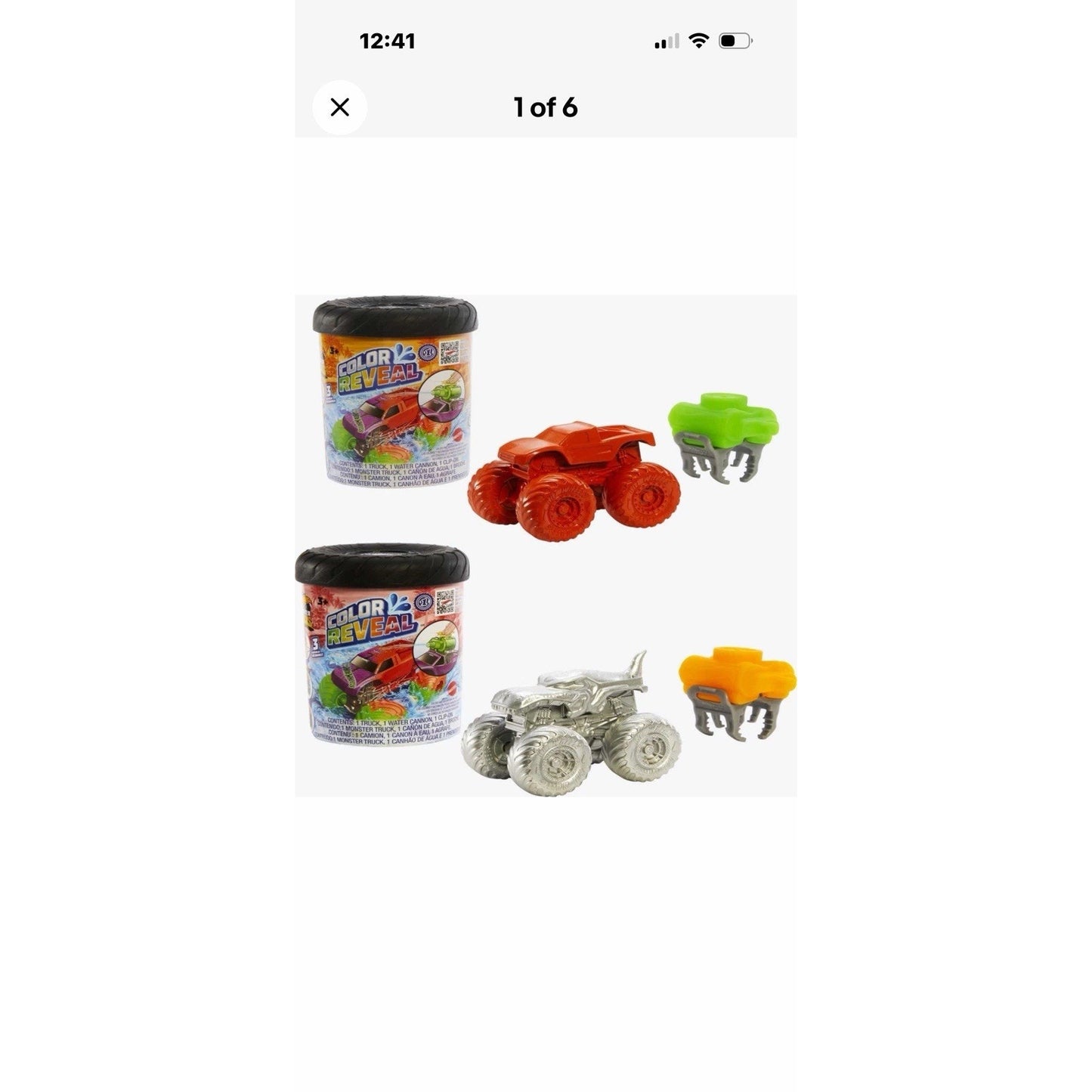Two color reveal toy sets featuring small monster truck figures, one bright red and one silver, each with a tub of color reveal compound and a claw tool in green and yellow.