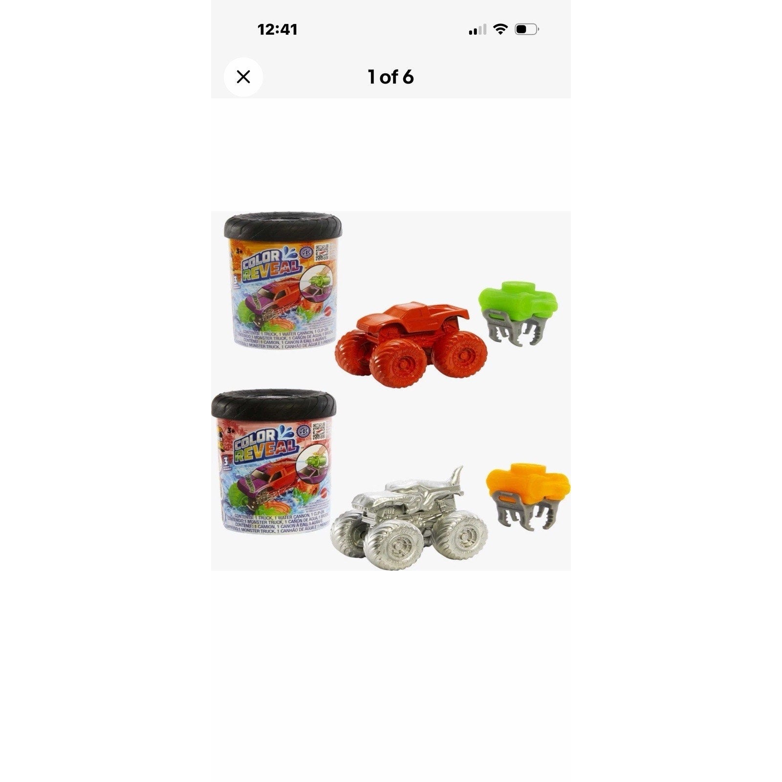 Two color reveal toy sets featuring small monster truck figures, one bright red and one silver, each with a tub of color reveal compound and a claw tool in green and yellow.