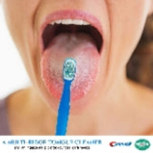 Close-up of a person using a blue Crest Scope Outlast Minibrush disposable toothbrush on their tongue
