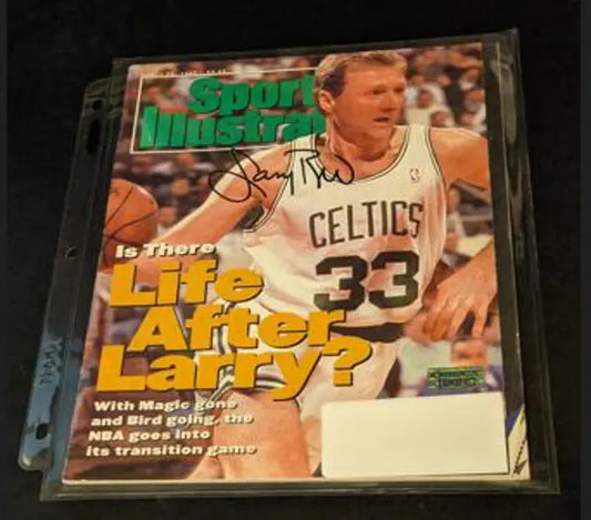 Larry Bird Autographed sports illustrated magazine with coa