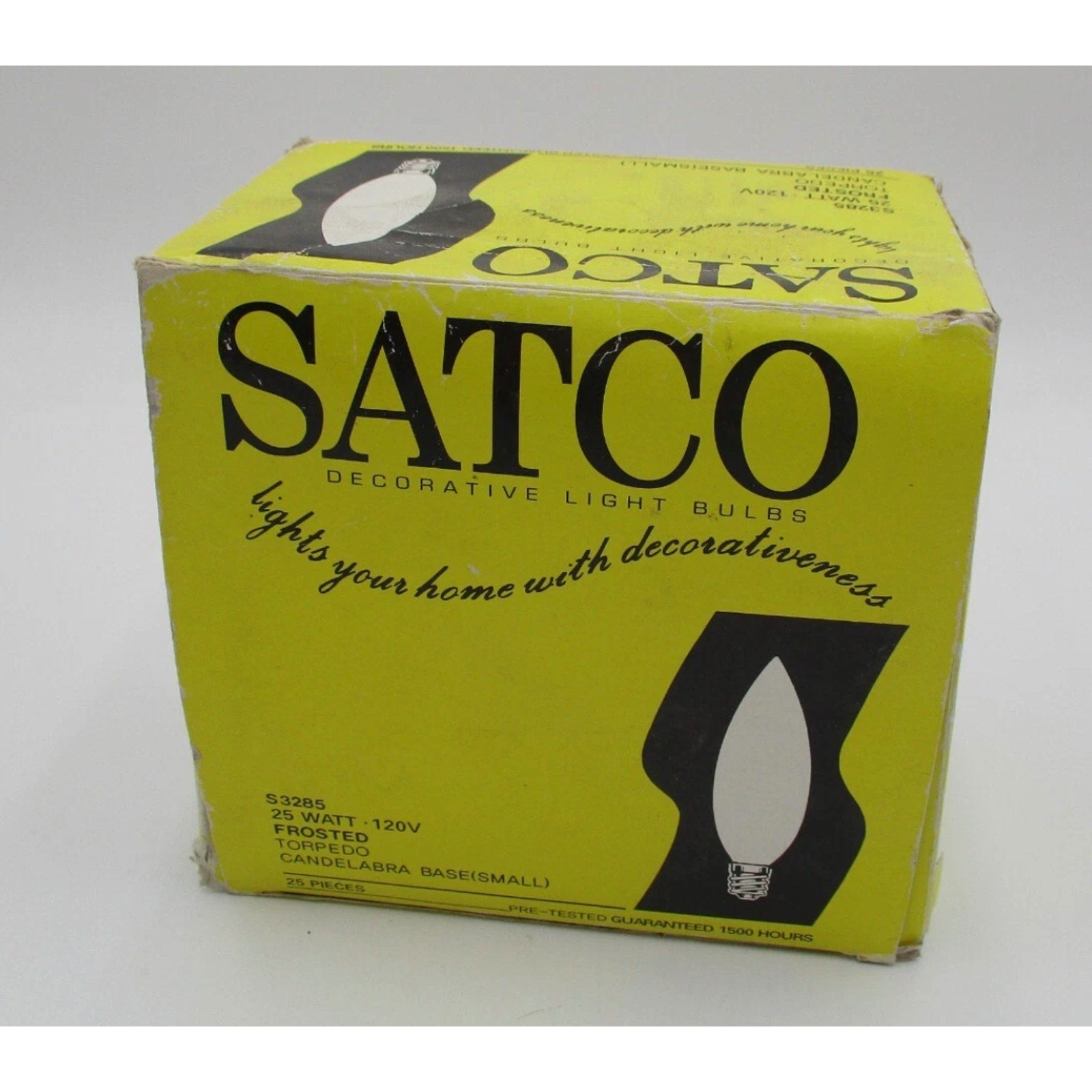 Yellow box of Satco decorative frosted torpedo candelabra base light bulbs 25 watt 120v S3285 vintage packaging