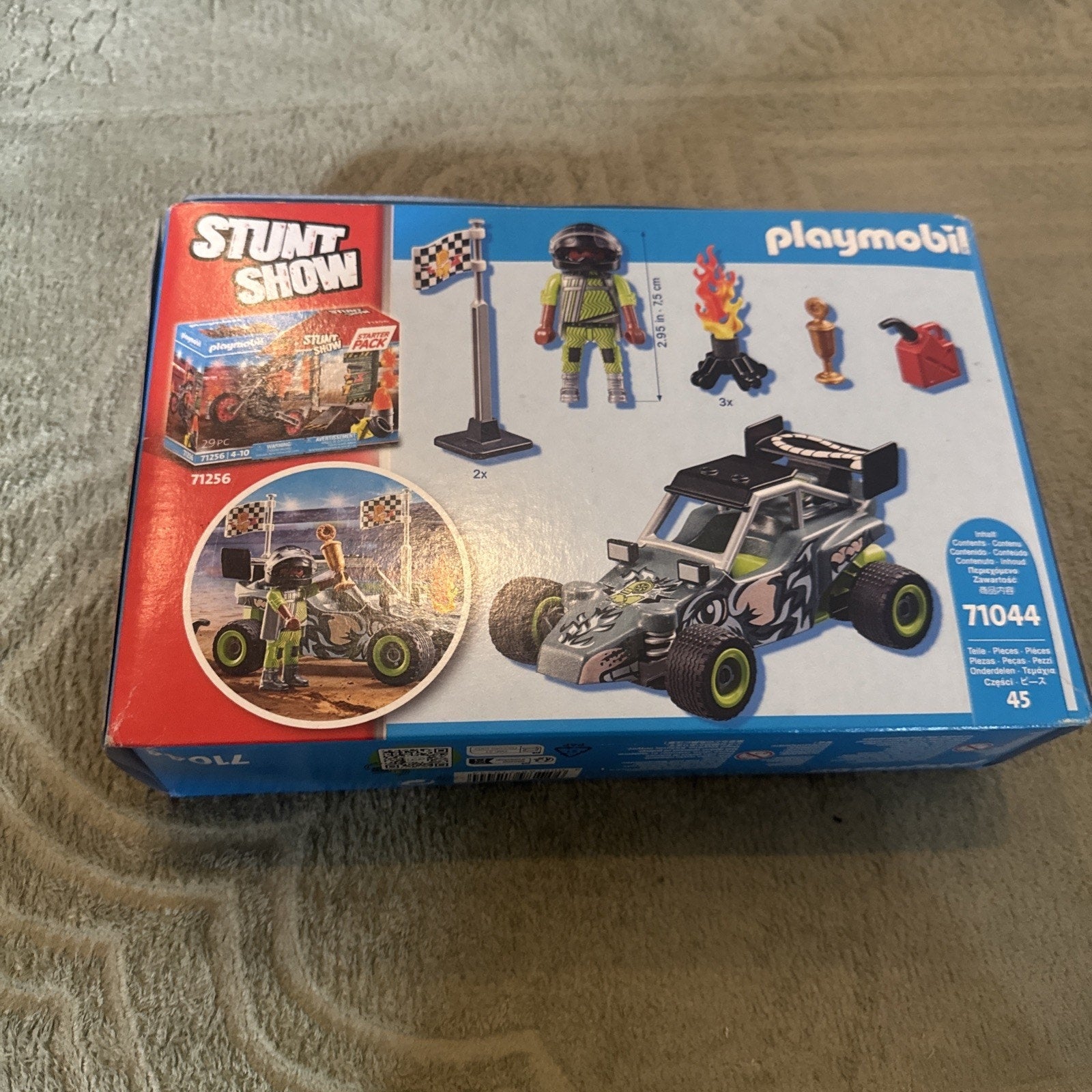 Playmobil 71044 Stunt Show Racing Off-Road Buggy toy set with driver figure and stunt accessories sealed box