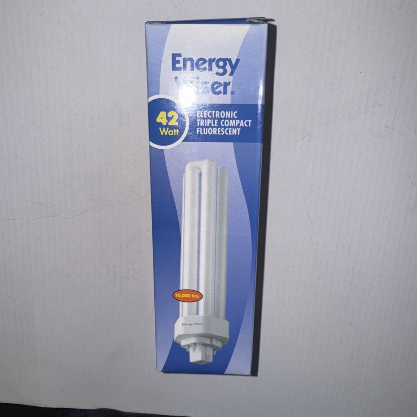 Energy Saver 42 Watt electronic triple compact fluorescent light bulb in blue and white packaging box