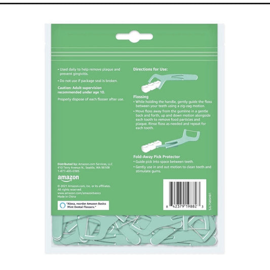 Back of Amazon Basics Mint Dental Flossers 90 count pack showing usage directions and safety cautions