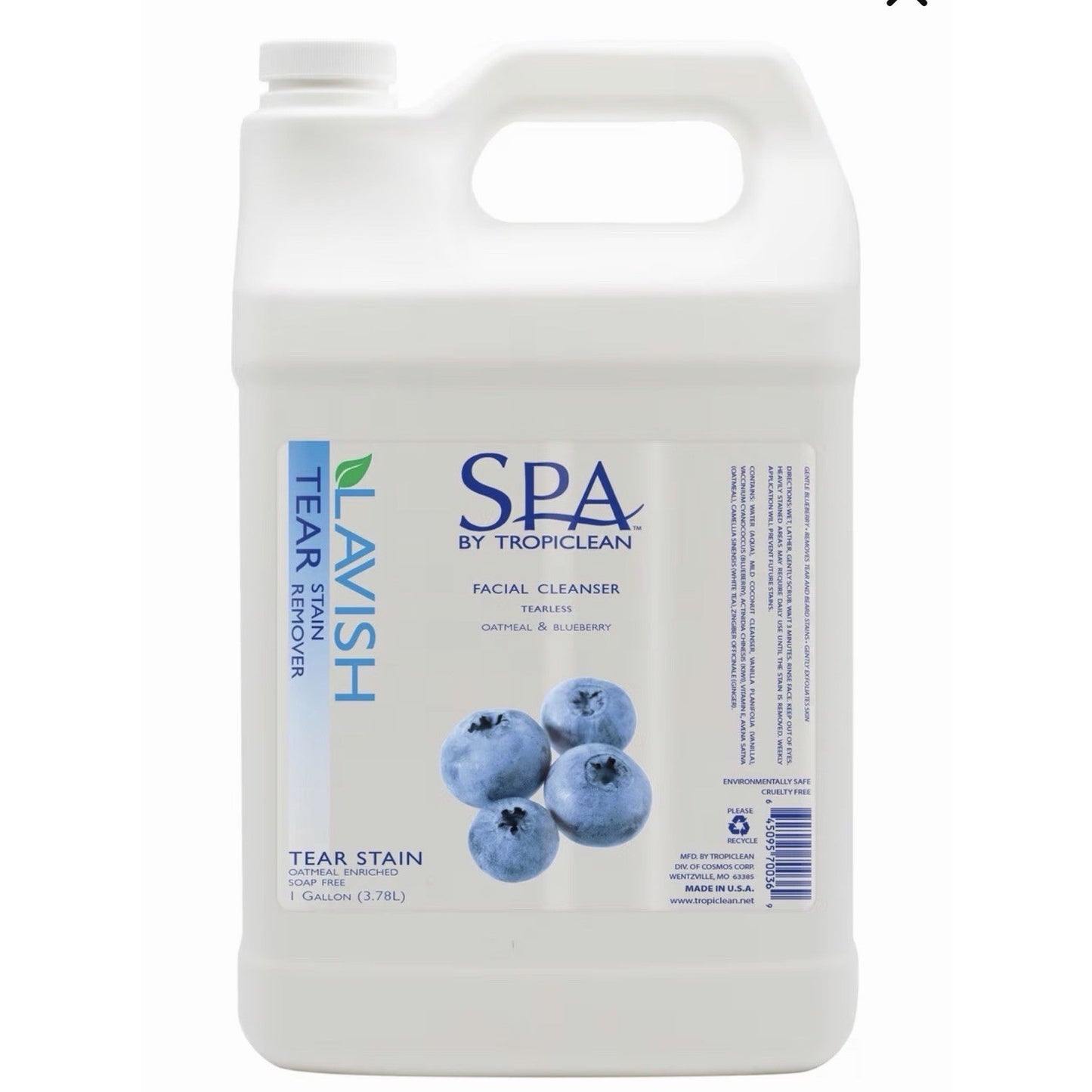 White plastic gallon jug with a handle featuring a label for Lavish Tear Stain Remover facial cleanser by TropiClean, decorated with an image of fresh blueberries and product information text.