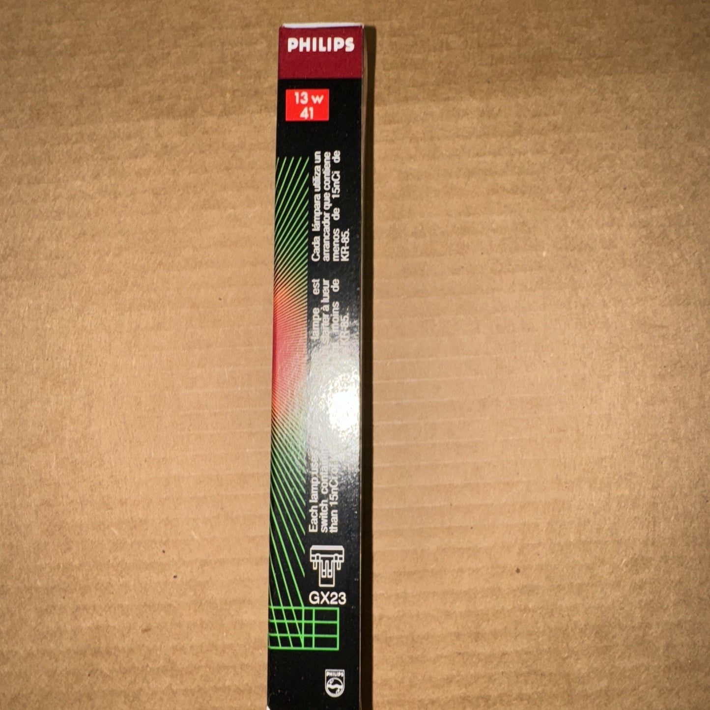 Philips PL-S 13W twin fluorescent tube bulb packaging with 2 pin GX23 base and warm white light label