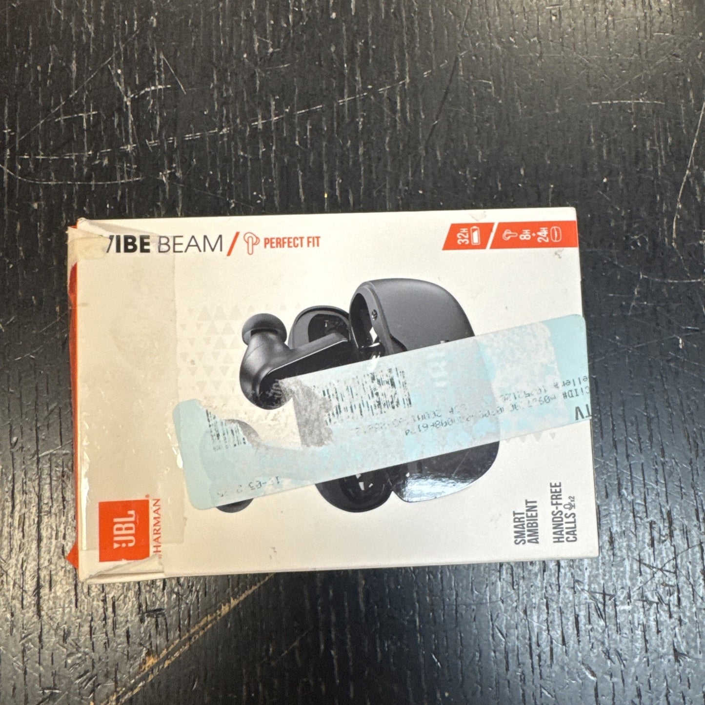 JBL Vibe Beam True Wireless Bluetooth Earbuds black with charging case on white retail box with orange accents