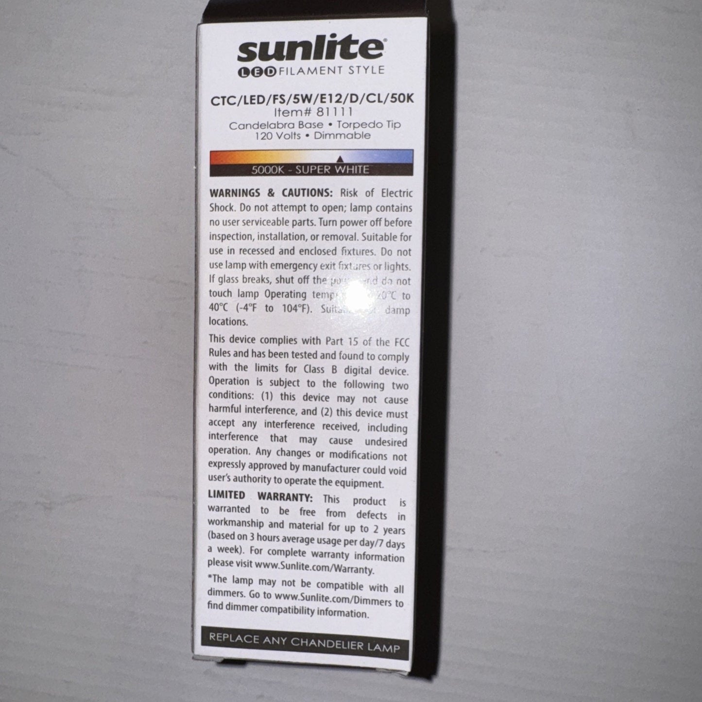 Sunlite LED chandelier bulb packaging showing product details wattage 5W voltage 120V and color temperature 5000K white