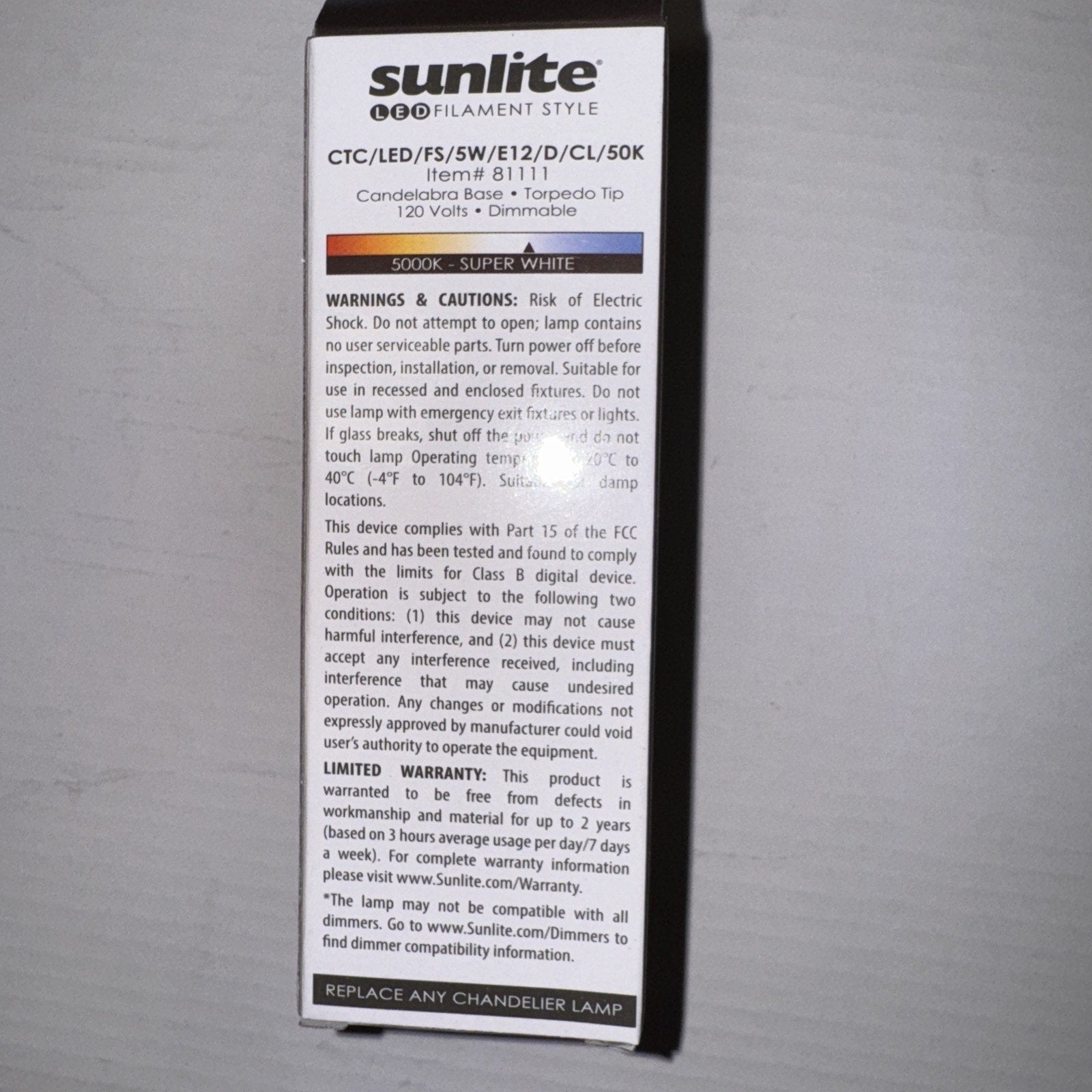 Sunlite LED chandelier bulb packaging showing product details wattage 5W voltage 120V and color temperature 5000K white
