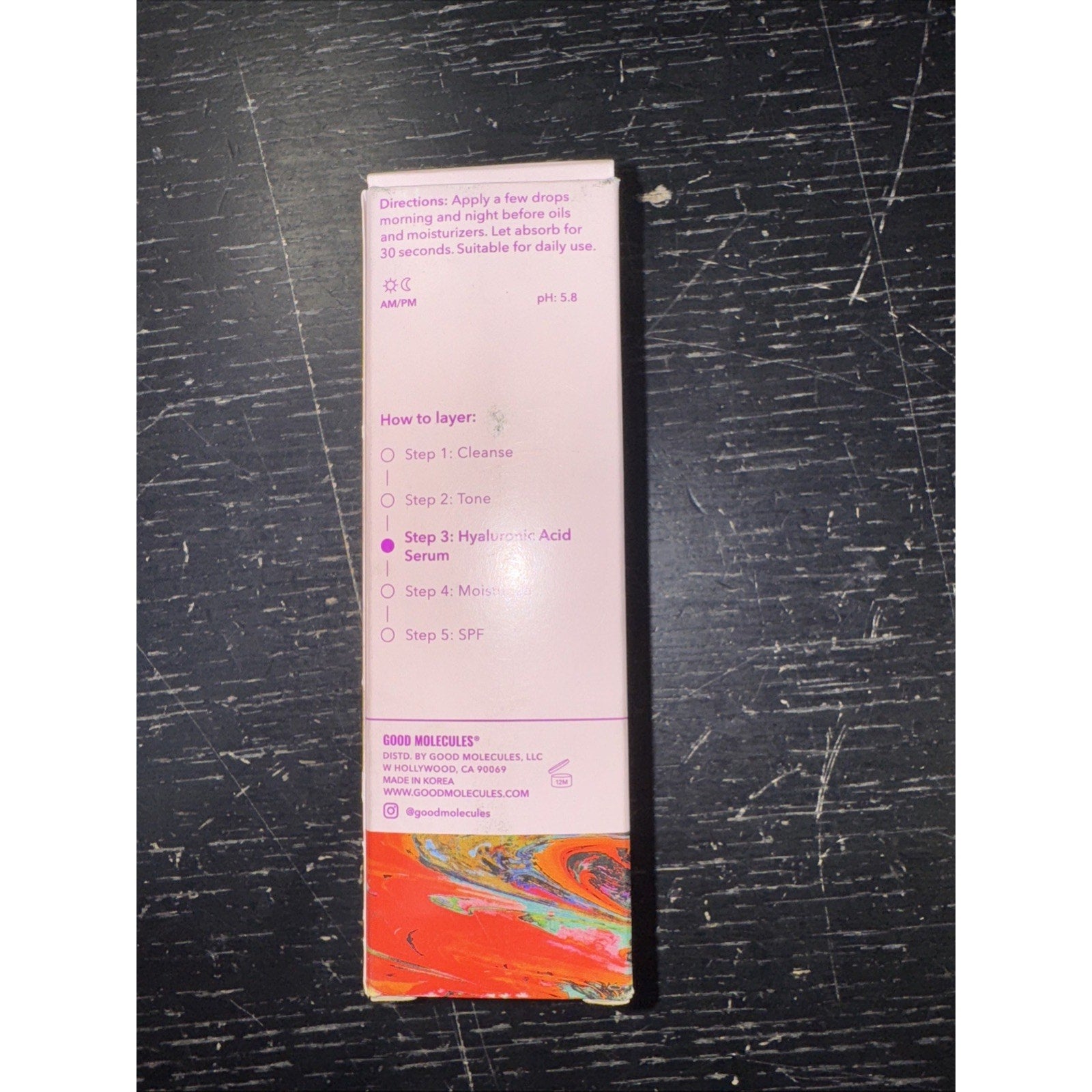 Good Molecules Hyaluronic Acid Serum packaging showing application steps and directions on pink background