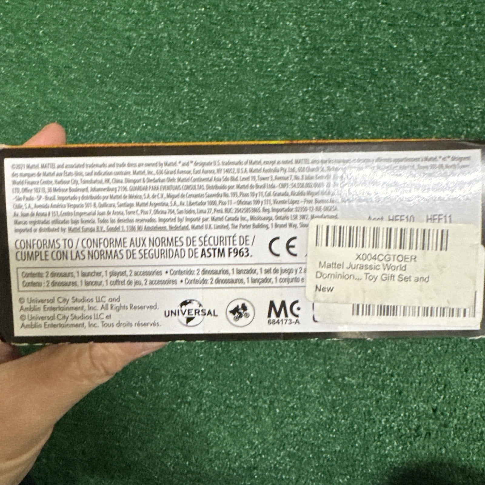 Back of Mattel Jurassic World Dominion Minis Action Mosasaurus Mayhem Playset box with safety and copyright information