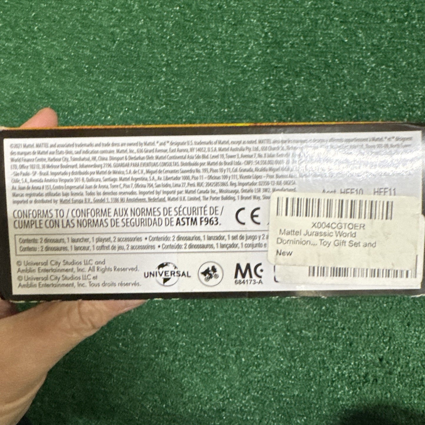 Back of Mattel Jurassic World Dominion Minis Action Mosasaurus Mayhem Playset box with safety and copyright information