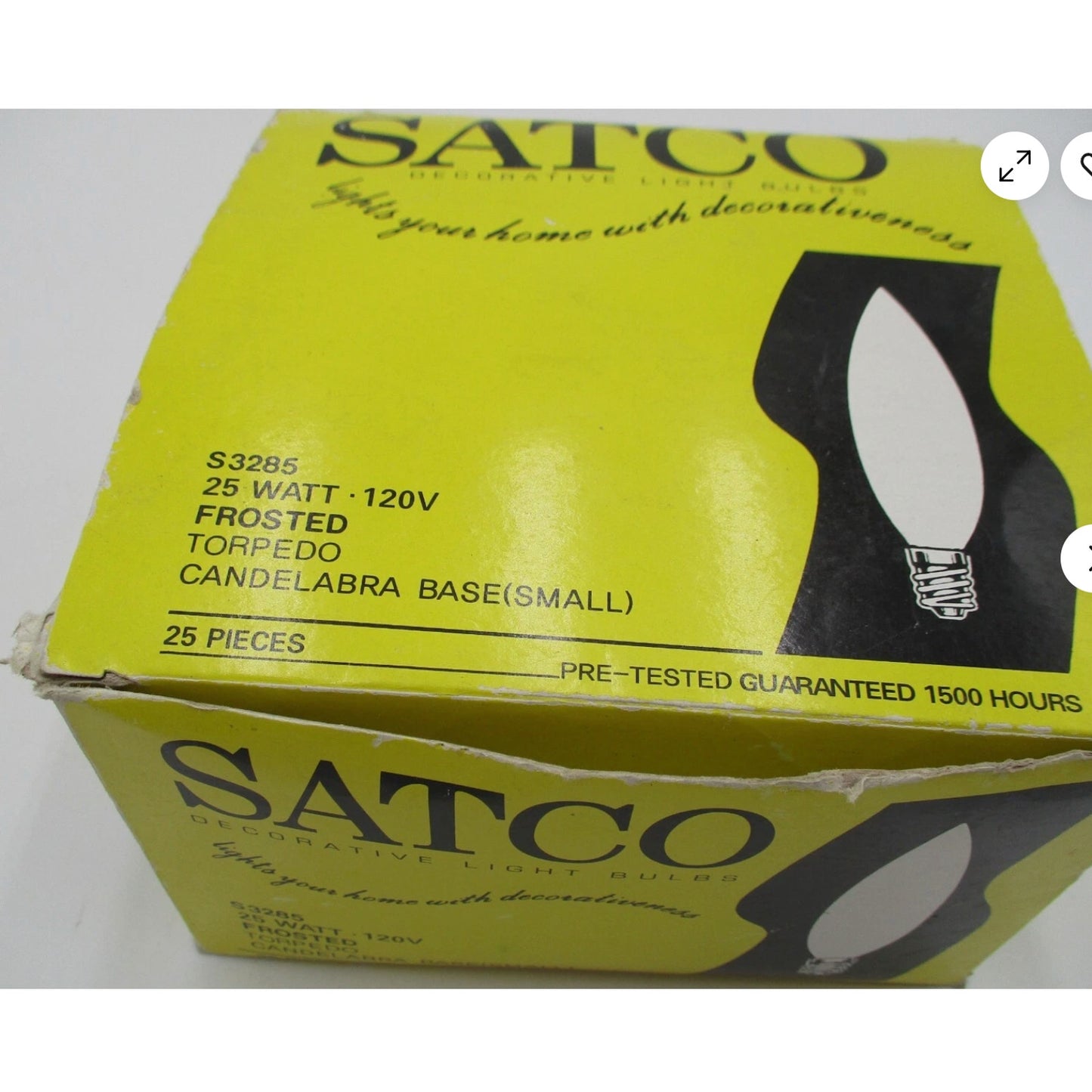 Box of 25 Satco 25W frosted torpedo candelabra base light bulbs with product details on yellow packaging