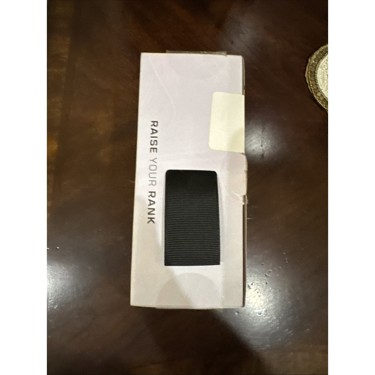 White packaging box with partial view of black Turtle Beach Recon Controller and slogan Raise Your Rank on side