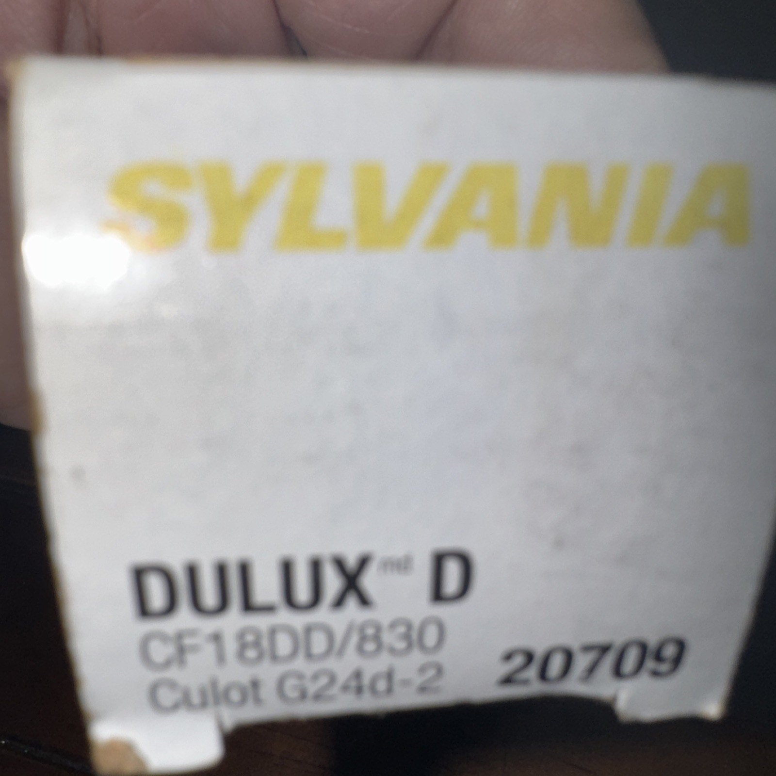 SYLVANIA Dulux D CF18DD 830 energy-saving 18 watt compact fluorescent light bulb box label close-up