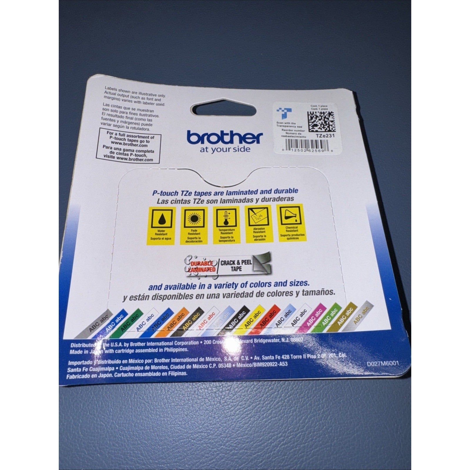 Back of Brother TZE231 laminated tape packaging with durability icons and color size options chart visible