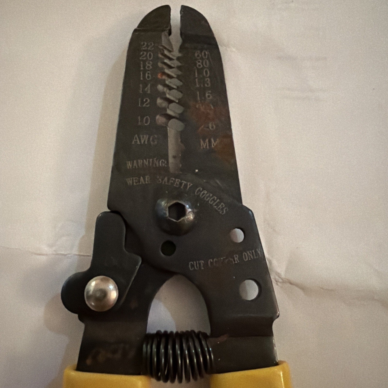 Jonard JIC-1022 Wire Stripper Cutter tool for 10 to 18 AWG wires with black metal head and yellow handles