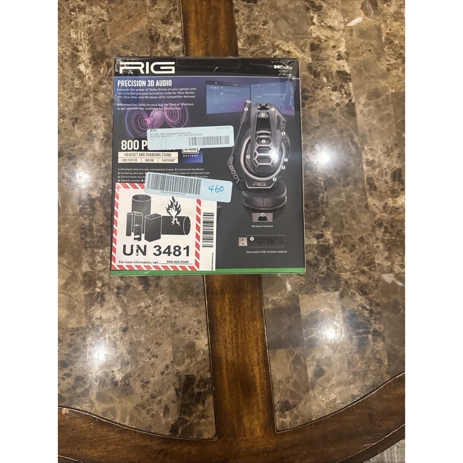 Nacon RIG Wireless Headset and Charging Stand for Xbox shown in retail packaging on marble table surface