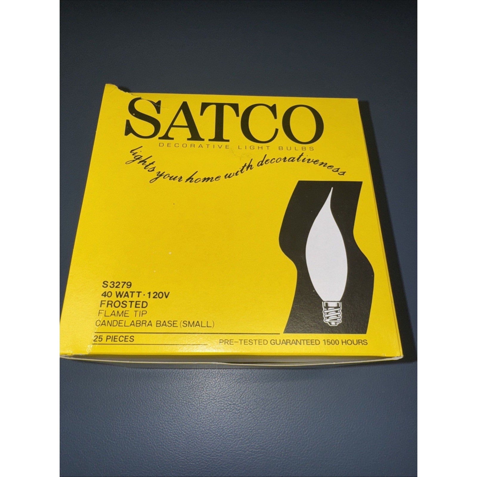 Yellow box of Satco S3279 frosted flame tip candelabra base bulbs 40W 120V with 25 bulbs inside