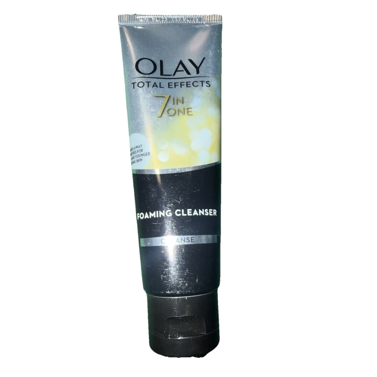 Silver and black tube of Olay Total Effects 7 in One Foaming Cleanser with a shiny finish, standing upright on a white background.