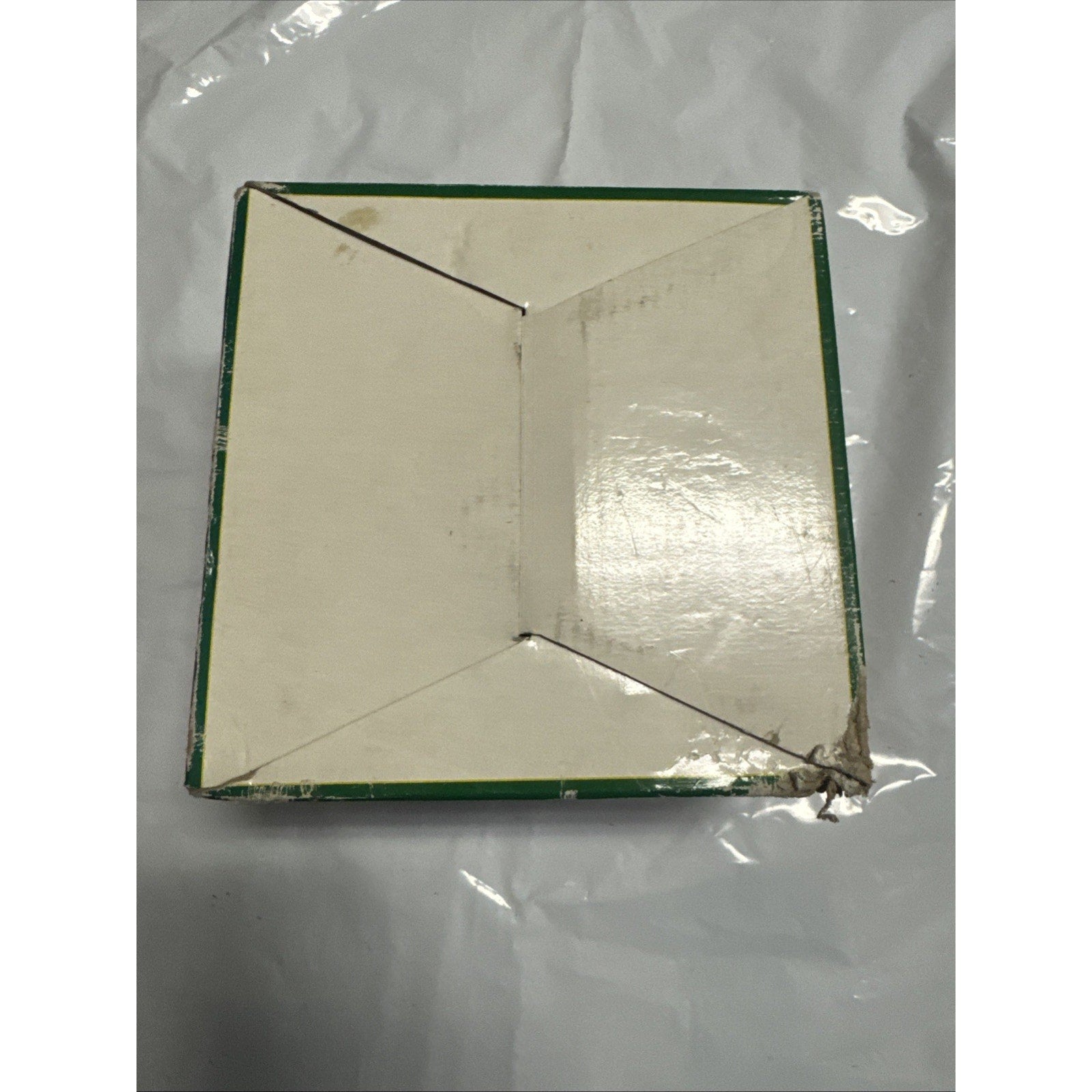 Square green and white cardboard box packaging for ND-303 low voltage halogen recessed light fixture shown from top angle